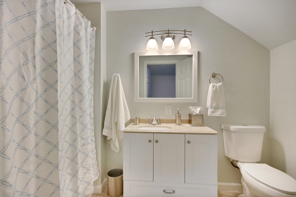 Updated bathroom with two sinks managed by Andrea Martin Homes in Tacoma, WA